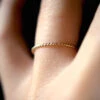 TWISTED THIN STACKING RING